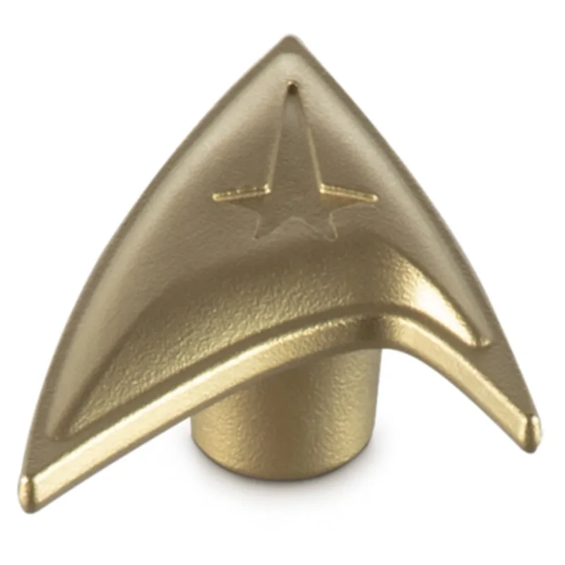 PUXADOR LE CREUSET STAR TREK STARFLEET DELTA EM FERRO FUNDIDO DOURADO 94051000000003