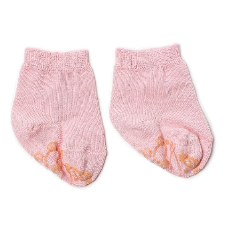 Zoquete Tex liso con antideslizante bebé talle nacimiento rosa