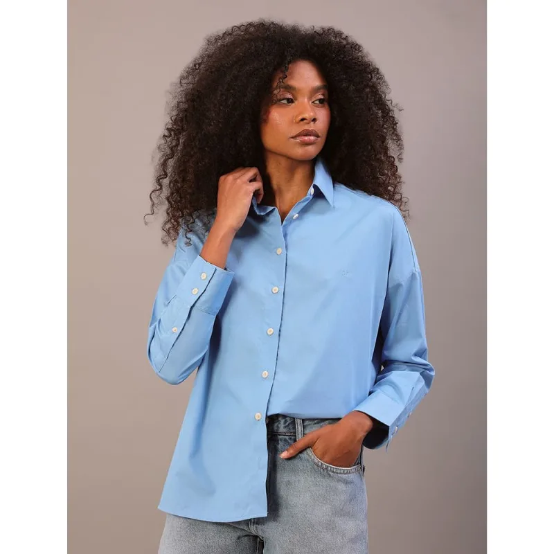 Camisa Calvin Klein Jeans Feminina Manga Longa Com Bordado Ck - Azul Claro Camisa Calvin Klein Jeans Feminina Manga Longa Com Bordado Ck Azul Claro 38