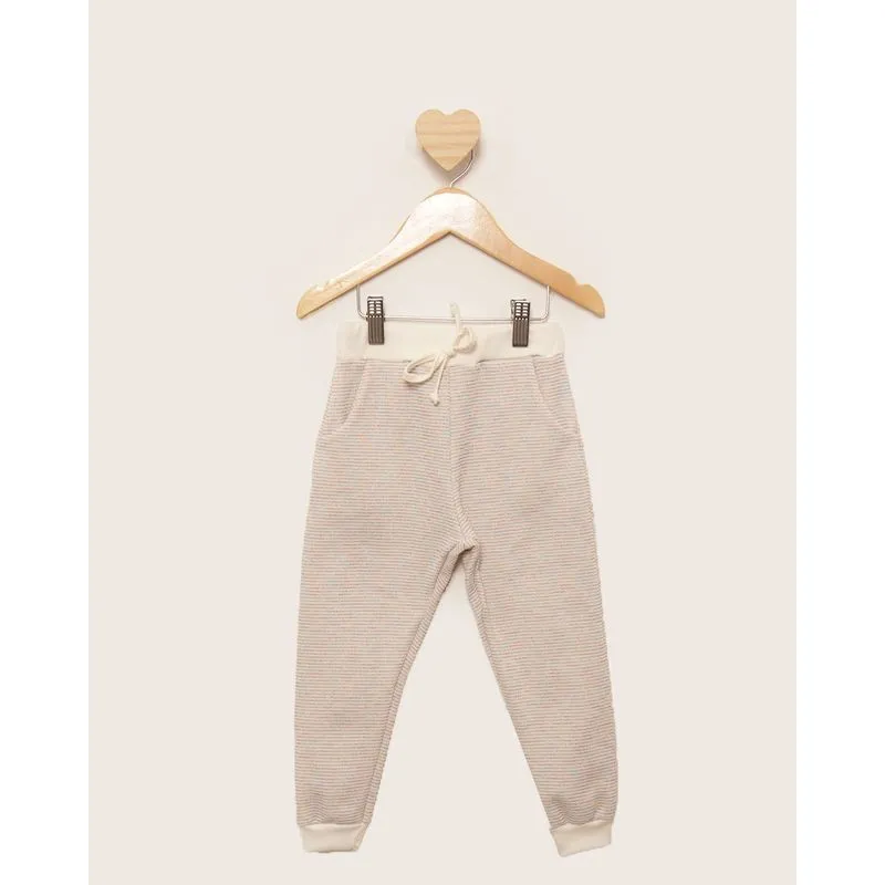 Calça Moletom Bebê Peluciada Jogger Com Lurex Bolsos Bege 1