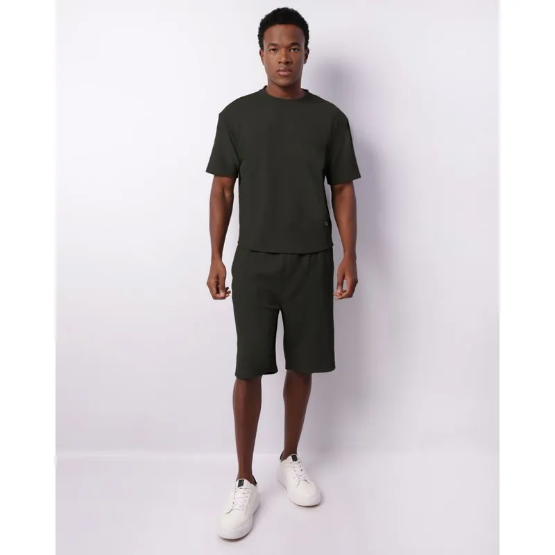 Bermuda Masculina Reta Texturizada com Bolsos Recortes Verde GG