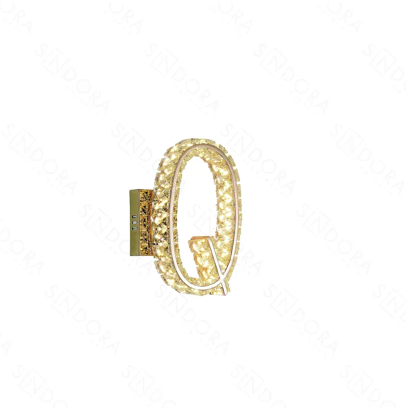 Arandela LETRA Q Ø22x28CM 10W 3000K 1000LM BIVOLT METAL DOURADO+CRISTAL TRANSPARENTE CX MASTER:69x36x56CM 18,5KG (10 UN.) Sindora DCB02935
