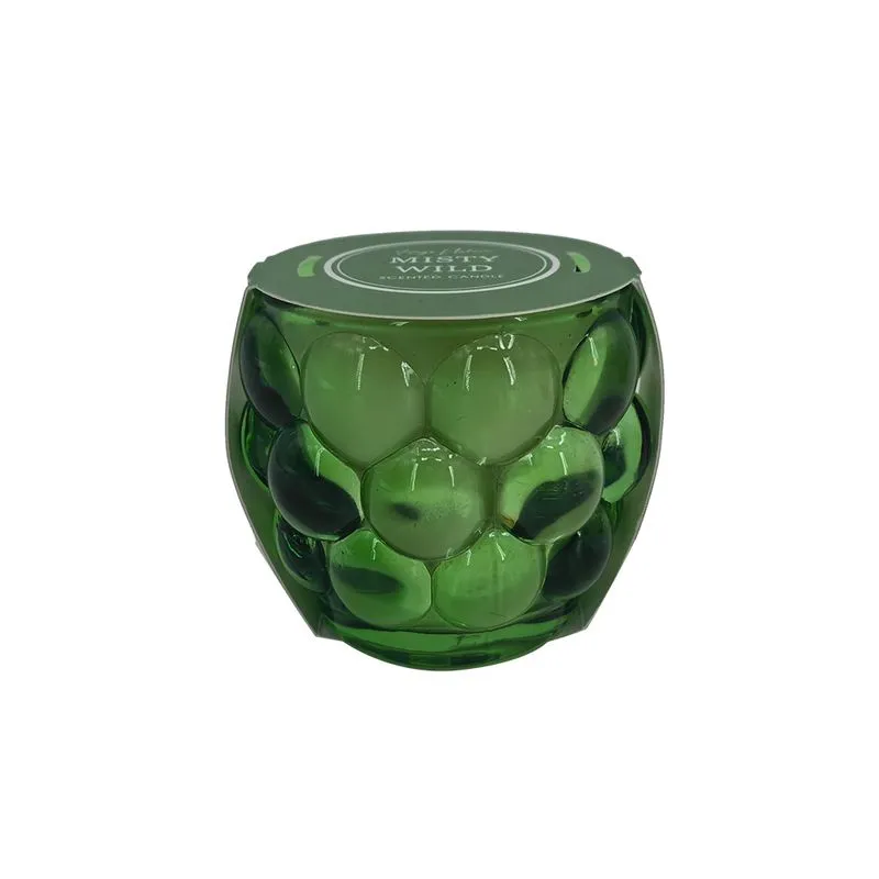 VELA AROMATIZADA EM VIDRO VERDE