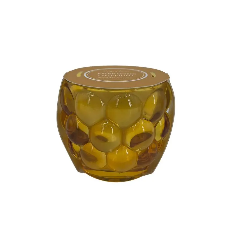 VELA AROMATIZADA EM VIDRO AMARELO