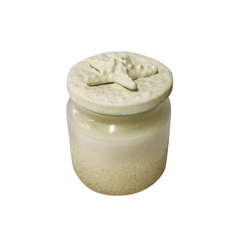 VELA AROMATIZADA EM VIDRO AREIA