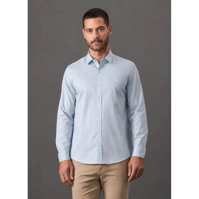 Camisa Masculina Slim Básica de Manga Longa Calvin Klein - Azul Claro Camisa Masculina Slim Básica de Manga Longa Calvin Klein Azul Claro Gg