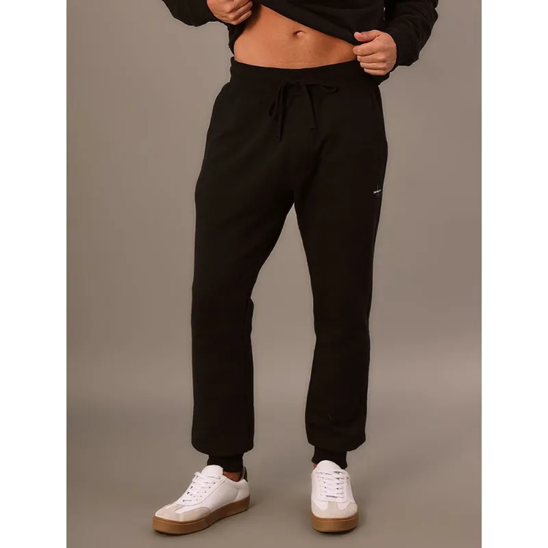 Calça Masculina Moletom Re Issue Calvin Klein Jeans - Preto Calça Masculina Moletom Re Issue Calvin Klein Jeans Preto p