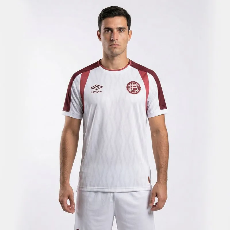 CAMISETA MASCULINA UMBRO CLUB ATLETICO LANUS OF.2 2026 - BLANCO/BORDO - XXL