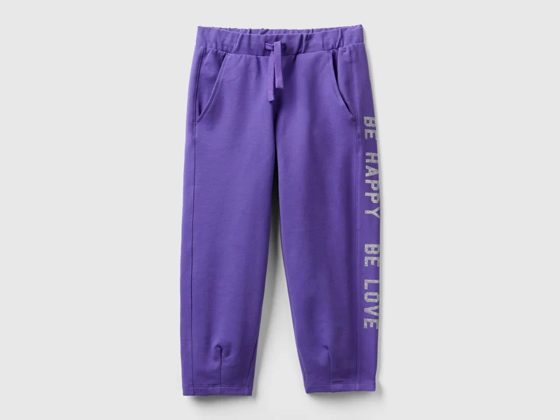 Joggers con stampa glitter M