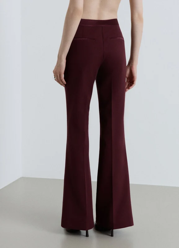 Pantaloni a zampa con fascia in raso L