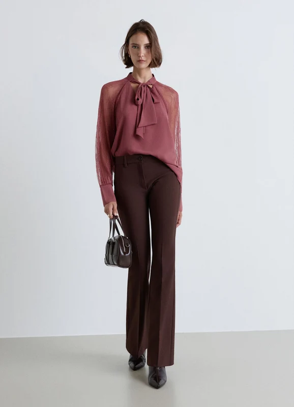 Blusa con fiocco e maniche in pizzo S