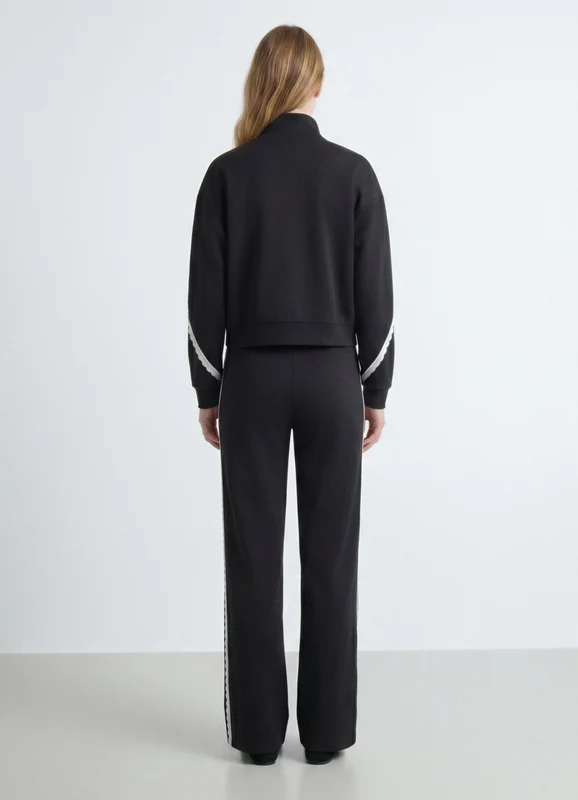 Leggings lunghi a zampa con inserto in pizzo S
