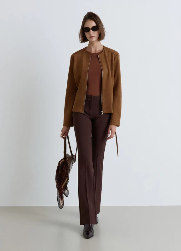 Giacca con zip e cintura in vita S