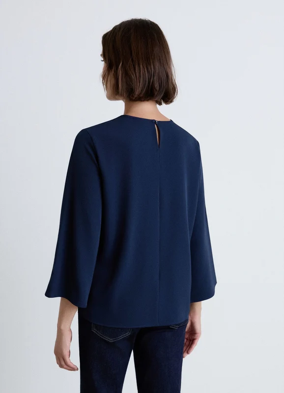 Blusa con apertura a goccia e dettaglio metallico XS