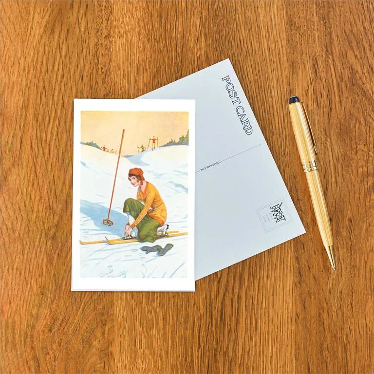 WS-27 Woman Skier Adjusting Skis - Vintage Image Postcard, Pack of 10