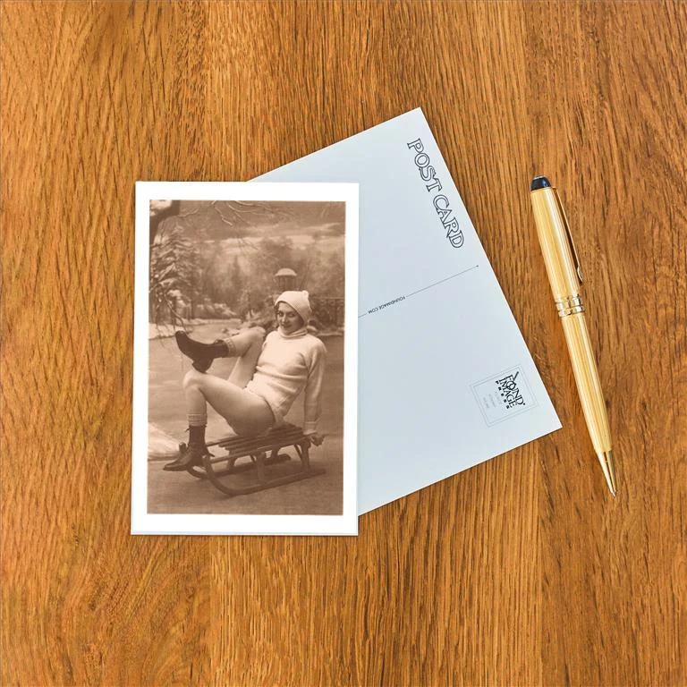 WS-32 Bare-Legged Woman on Sled - Vintage Image Postcard, Pack of 10