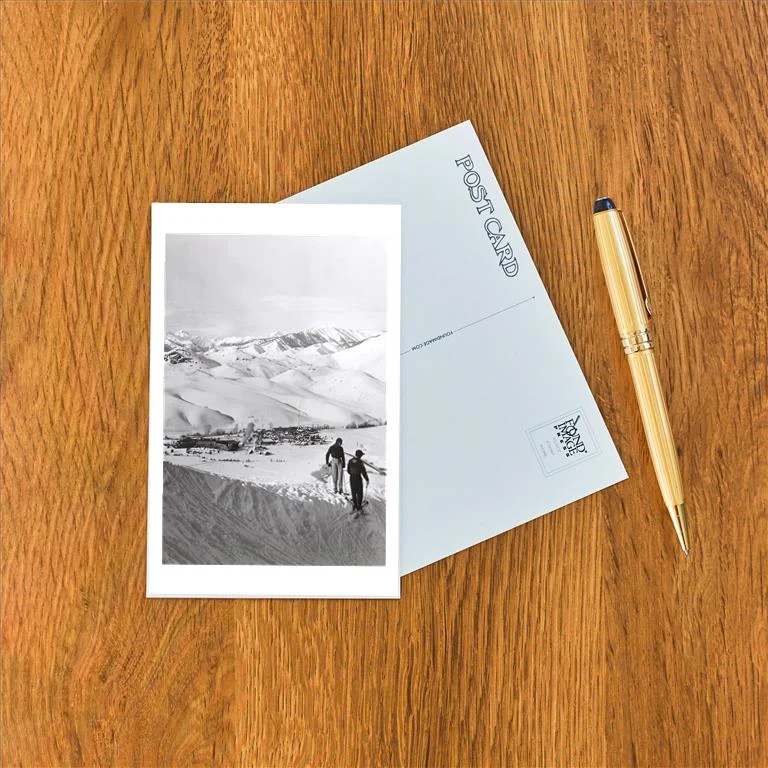WS-198 Skiing Couple above Resort - Vintage Image Postcard, Pack of 10