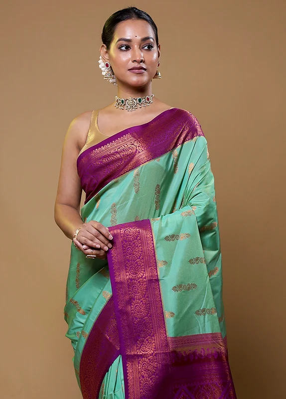 Green Kanjivaram Silk Saree With Blouse Piece Onesize