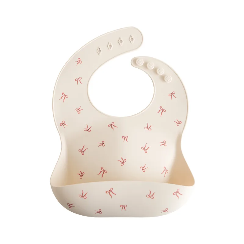 Babador Cata-Migalhas De Silicone Laços Mushie