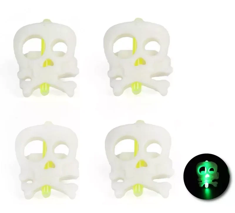 Pack de 4 Anillos calaveras luminiscente de 2,4x2,2x2,6 cm T.Única