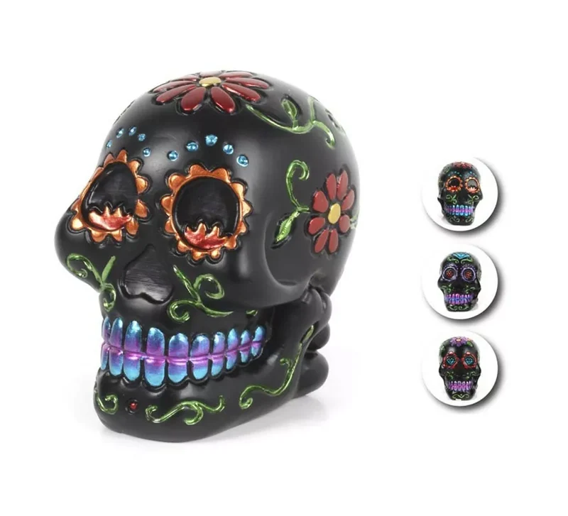 Cráneo Día de Muertos de resina en colores surtidos de 5,5x7,3x7,5 cm T.Única