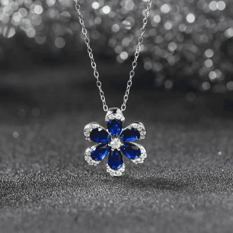 COLLAR EN PLATA LEY DE FLOR AZUL