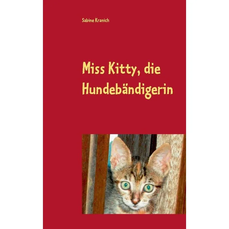 Miss Kitty, die Hundebändigerin